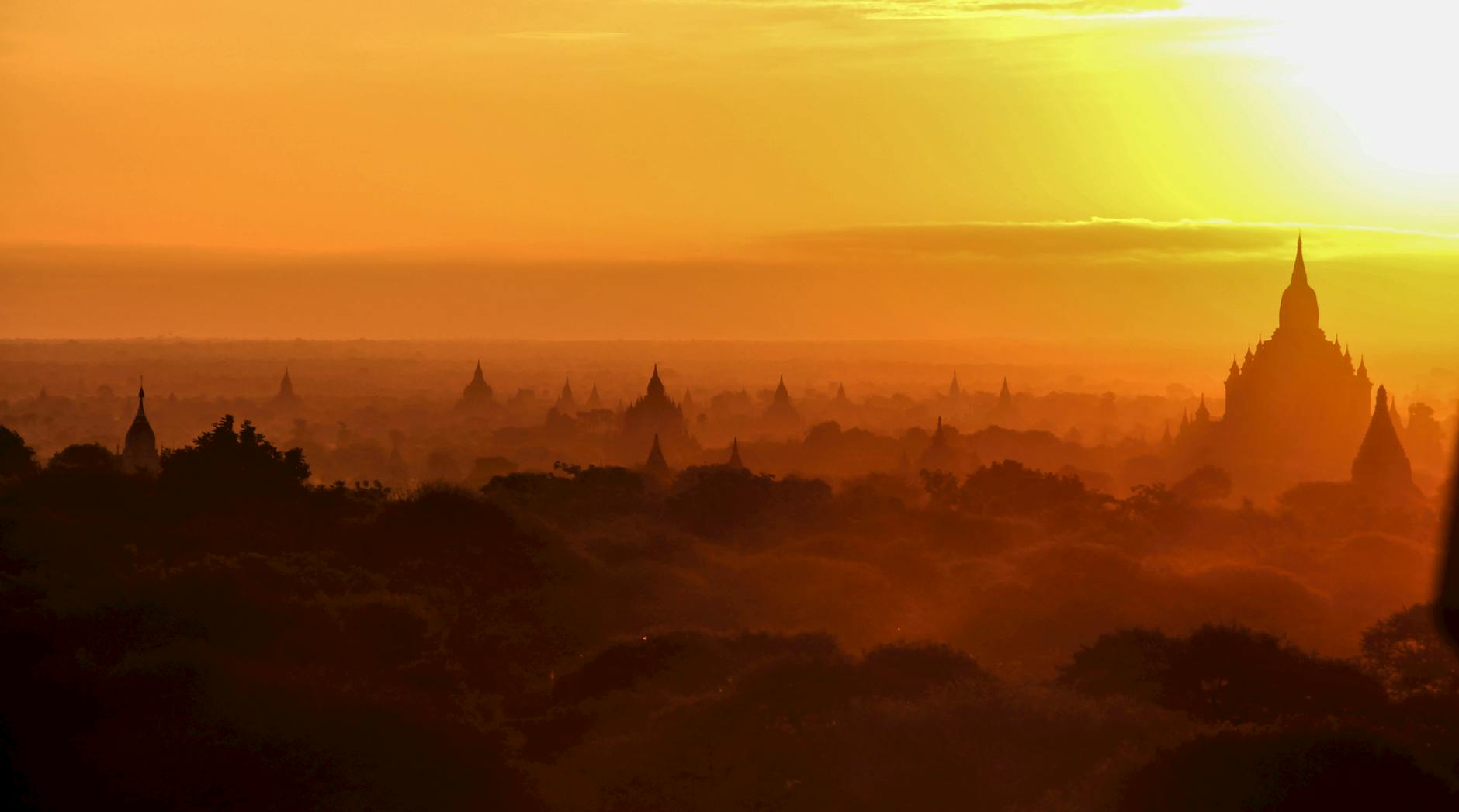 foggy cityscape at golden hour